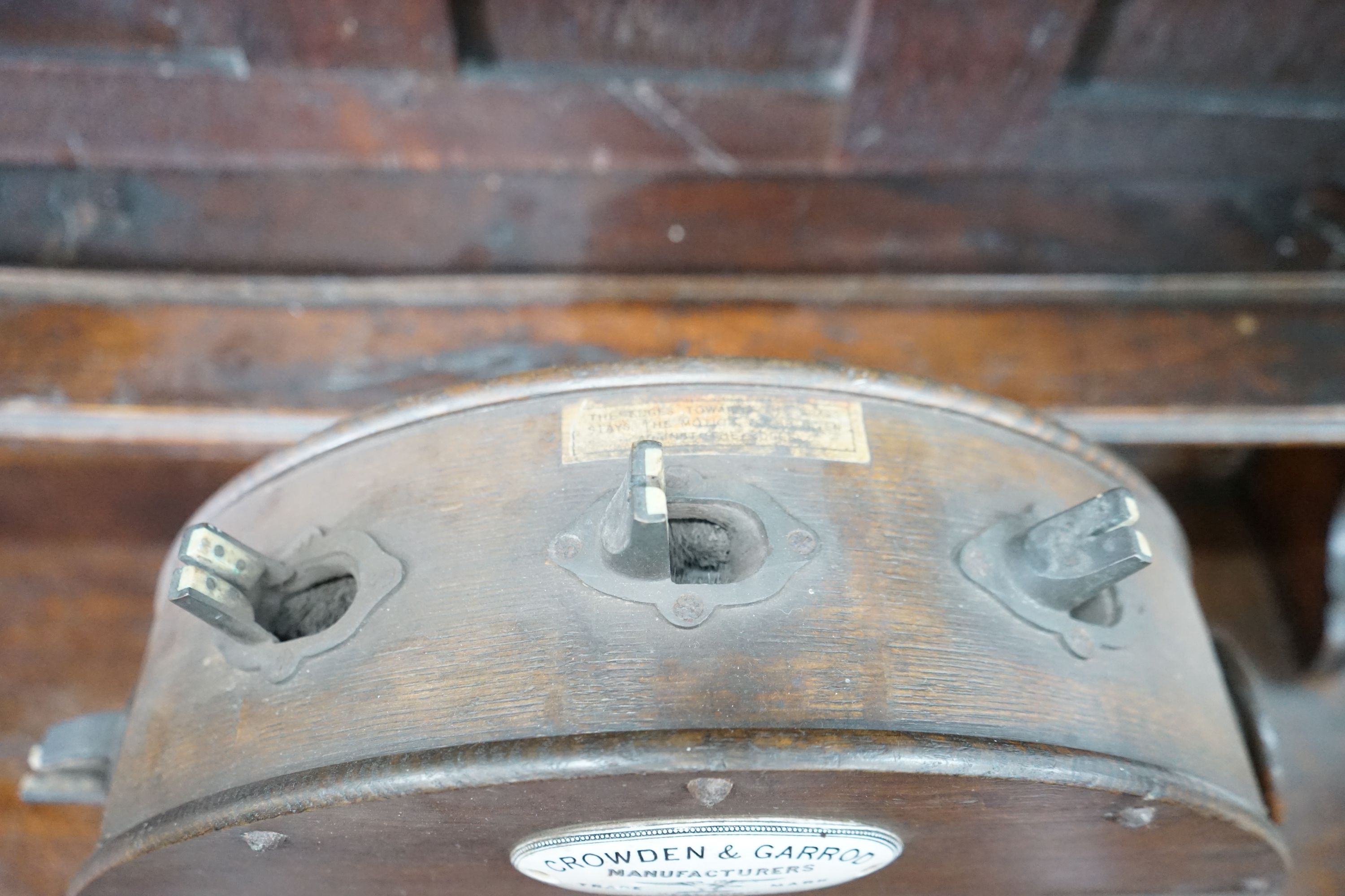 A Victorian cast iron mounted mahogany knife polisher, height 44cm